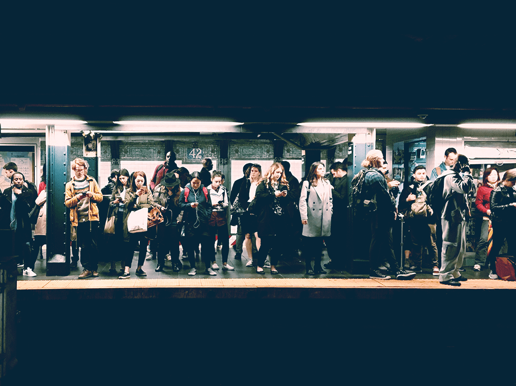 A busy subway platform in NY. Photo by Eddi Aguirre on Unsplash